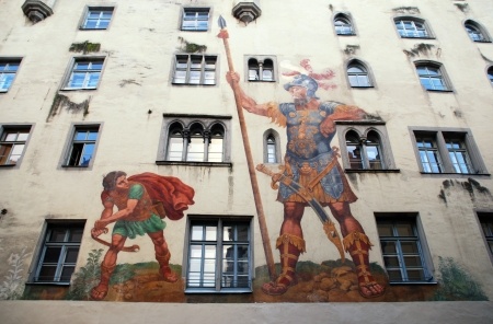 David and Goliath fresco on medieval house wall,Regensburg, Bavaria, Germany. Medieval center of Regensburg is a UNESCO World Heritage Site. 